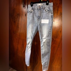 Light wash. High rise skinny. Size 7.